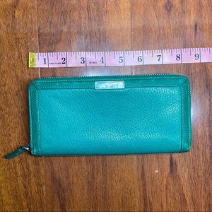 Tumi turquoise green long wallet